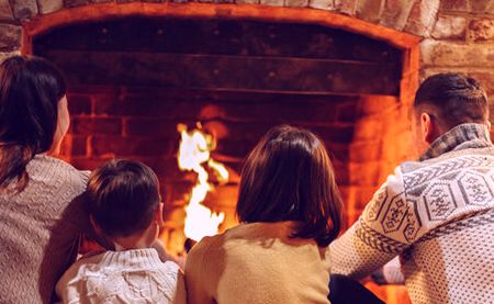 Family gathered at a finished hearth